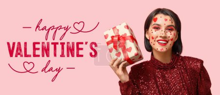 Photo for Festive banner for Happy Valentine's Day with stylish young woman and gift - Royalty Free Image