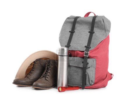 Photo for Set of camping equipment with backpack, thermos and flashlight on white background - Royalty Free Image