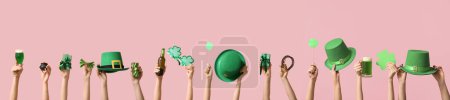 Photo for Many hands with beer, gifts and decor on pink background. St. Patrick's Day celebration - Royalty Free Image