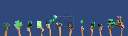 Photo for Many hands with gifts and decor on blue background. St. Patrick's Day celebration - Royalty Free Image