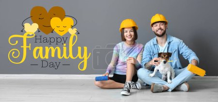Foto de Banner para Feliz Día de la Familia con pareja joven con herramientas de pintor y lindo perro - Imagen libre de derechos