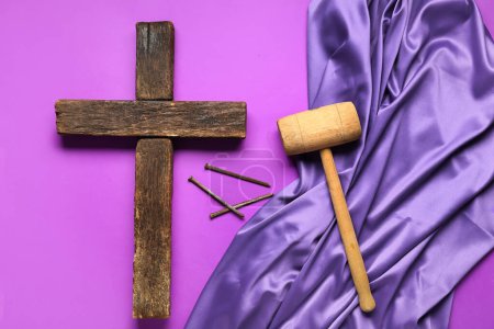 Photo for Wooden cross with purple cloth, hammer and nails on color background. Good Friday concept - Royalty Free Image