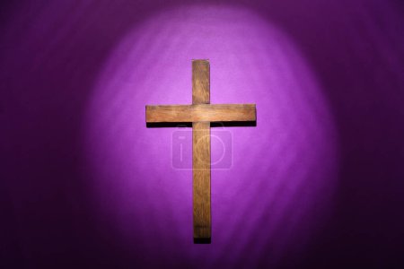 Photo for Wooden cross on purple background. Good Friday concept - Royalty Free Image