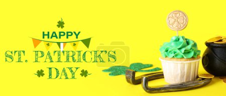 Photo for Festive banner for Happy St. Patrick's Day with horseshoe and cupcake - Royalty Free Image