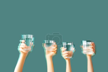 Photo for Trembling hands with glasses of water on color background. Parkinson's Awareness Month - Royalty Free Image