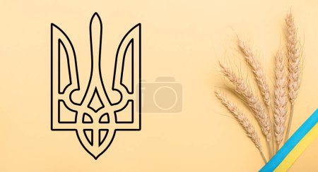 Weizenstacheln und Bänder in den Farben der ukrainischen Flagge mit Wappen auf gelbem Hintergrund