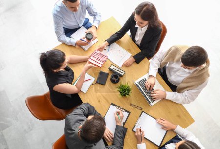 Photo for Group of business people working at table in conference hall, top view - Royalty Free Image