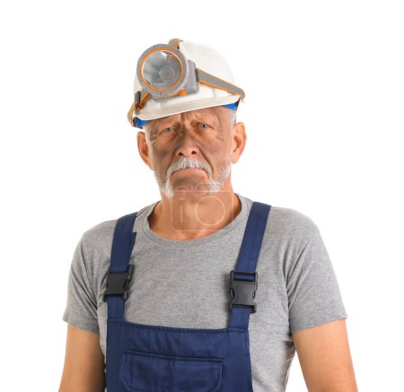 Mature miner man on white background