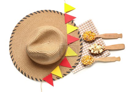 Spoons with corn, flags, straw hat and napkin on white background. Festa Junina (June Festival) celebration