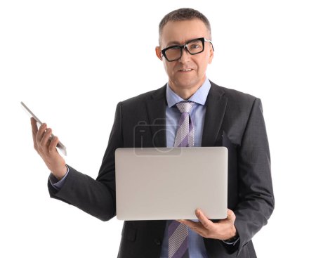 Funny businessman with askew glasses, laptop and mobile phone isolated on white background