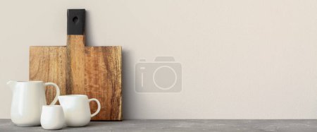 Photo for Kitchen utensils on grey table near white wall. Banner for design - Royalty Free Image