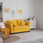Interior of children's room with yellow sofa and armchair