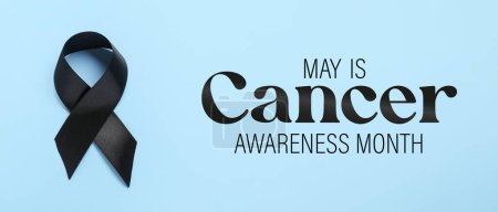 Photo for Black ribbon and text MAY IS CANCER AWARENESS MONTH on light blue background. Melanoma concept - Royalty Free Image