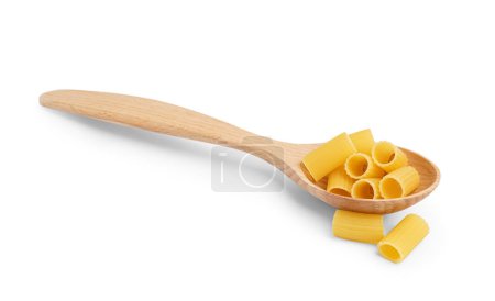 Wooden spoon with uncooked tortiglioni pasta on white background