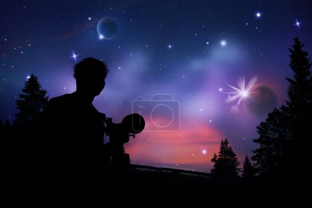 Silhouette of man observing stars through a telescope in space at night