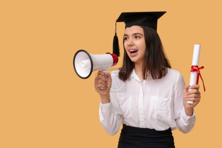 Photo for Female student in graduation hat with diploma and megaphone on orange background - Royalty Free Image
