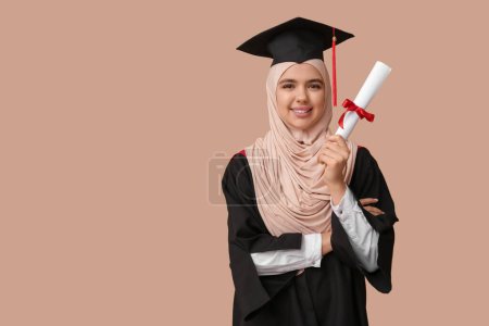 Photo for Happy Muslim female graduating student with diploma on beige background - Royalty Free Image