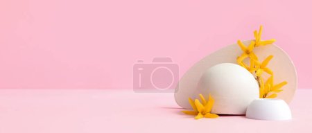 Photo for Decorative podiums and beautiful yellow flowers on pink background with space for text - Royalty Free Image