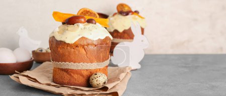 Photo for Tasty Easter cakes and eggs on table. Banner for design - Royalty Free Image