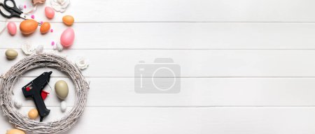 Photo for Items for making Easter wreath on white wooden background with space for text - Royalty Free Image