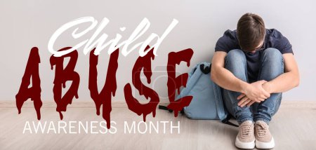 Awareness banner for National Child Abuse Prevention Month with sad teenage boy sitting on floor