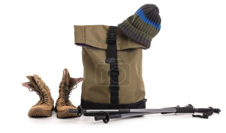 Photo for Set of camping equipment with backpack, trekking poles and boots on white background - Royalty Free Image