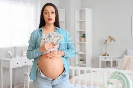 Shocked young pregnant woman with money in children's bedroom. Maternity Benefit concept