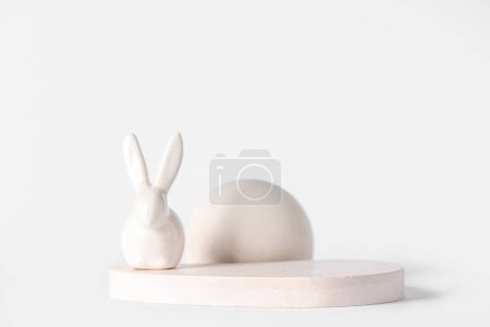 Photo for Decorative podiums with toy bunny on white background. Easter celebration - Royalty Free Image