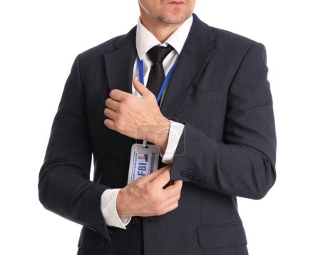 Mature FBI agent in suit on white background, closeup