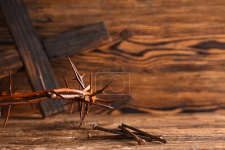 Photo for Crown of thorns with nails on wooden background, closeup. Good Friday concept - Royalty Free Image