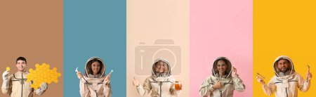 Group of young beekeepers on color background