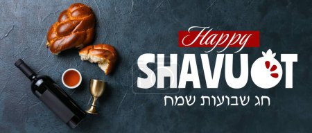 Traditional challah bread with wine and honey on dark background. Happy Shavuot