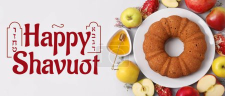 Greeting banner for Shavuot with cake, honey, pomegranates and apples