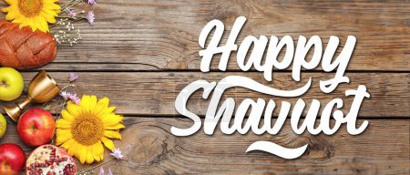Photo for Greeting banner for Shavuot with bread, flowers and fruits - Royalty Free Image