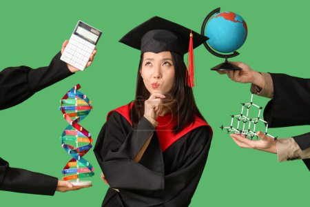 Photo for Thoughtful Asian female graduate student choosing subjects on green background - Royalty Free Image
