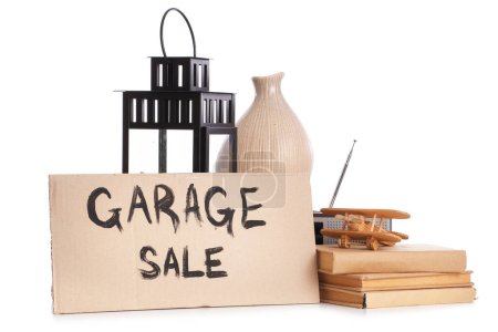 Photo for Cardboard with text GARAGE SALE and unwanted stuff on white background - Royalty Free Image