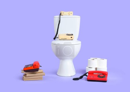 Toilet bowl with telephones, paper rolls and books on lilac background