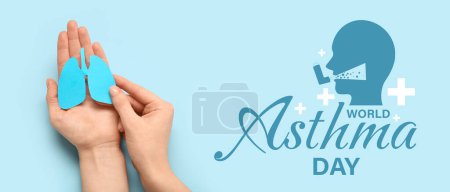 Banner for World Asthma Day with female hands holding paper lungs