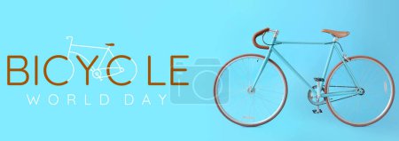 Modern bicycle on blue background. Banner for World Bicycle Day