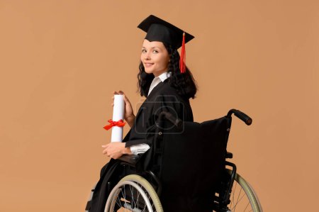 Beautiful female graduate student in wheelchair with graduation cap and diploma on brown background