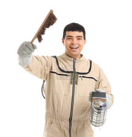 Male beekeeper with supplies on white background
