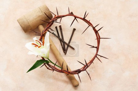 Crown of thorns with lily, hammer and nails on light background