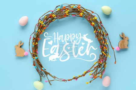Photo for Beautiful Easter greeting card with frame made of tree branches, eggs and bunnies on light blue background - Royalty Free Image