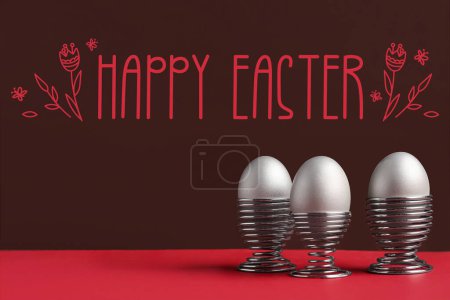Photo for Beautiful Easter greeting card with eggs on dark red background - Royalty Free Image