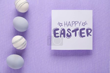 Photo for Easter greeting card and eggs on lilac background - Royalty Free Image