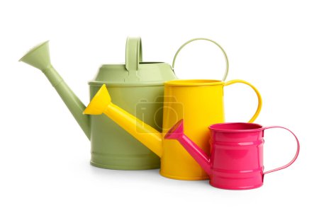 Watering cans on white background