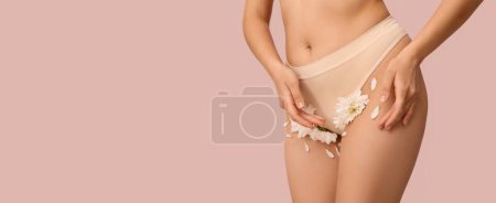 Photo for Young woman with flowers on pink background with space for text, closeup. Depilation concept - Royalty Free Image