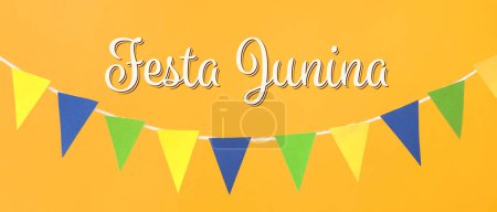 Garland and text FESTA JUNINA (June Festival) on yellow background