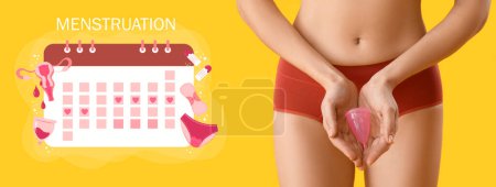 Photo for Young woman in menstrual panties, with silicone cup and drawn menstrual calendar on yellow background - Royalty Free Image