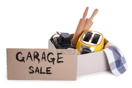 Photo for Box of unwanted stuff and cardboard with text GARAGE SALE on white background - Royalty Free Image